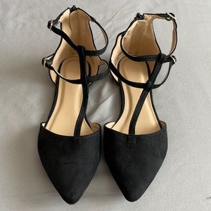 Black T-strap flats